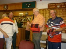 Roger Taplin displaying the Rebellion beer mats