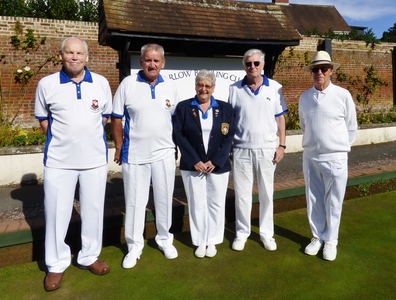 Mens Handicap Pairs finalists with organiser Felicity in between.