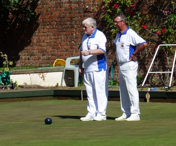 Dave White and Brian Jones watching in earnest.