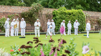 The flower beds are thriving on the much needed rain but not sure the players are too impressed !