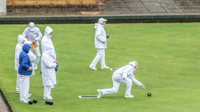 Ann White unperturbed by the wet conditions