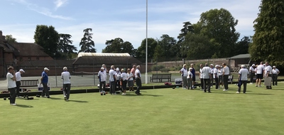 The players assembling on the green just before the start of play, can you pick out the players from the past ?