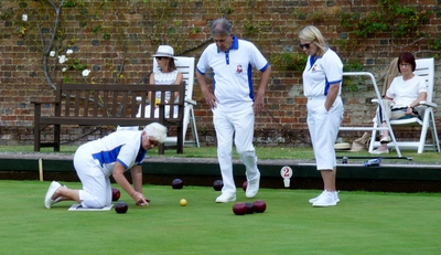 One of many measures that Pam Butler undertook during the 101 singles final ! Busy day for Pam.