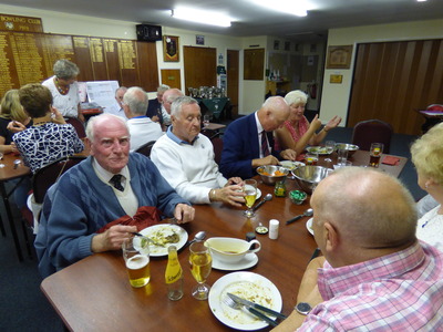 Bill Pocock enjoying his food along with all the others.